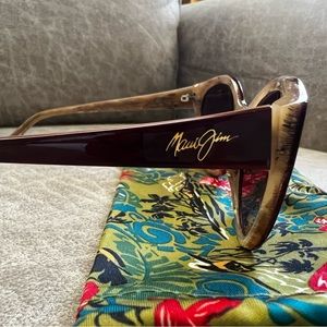 In mint condition only wore once. Maui Jim sunglasses authentic w/sleeve storage